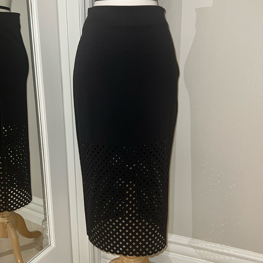 Black Pencil Midi skirt with cut outs